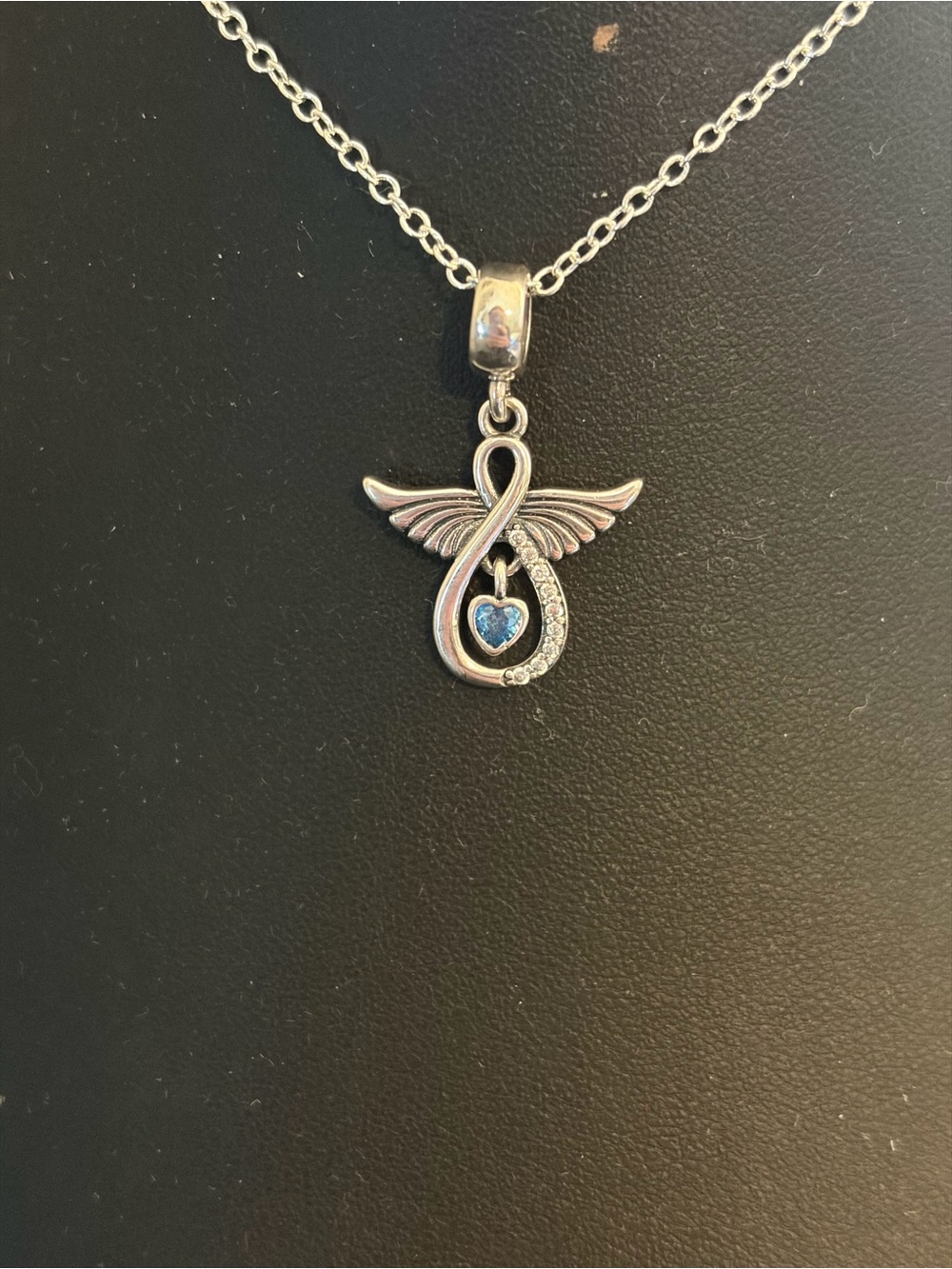 Silver Angel Wing Pendant Necklace with Blue Heart Accent
